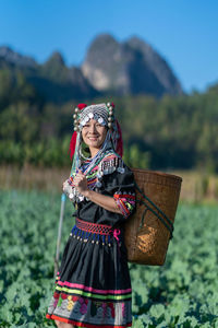 Woman wearing mask on field