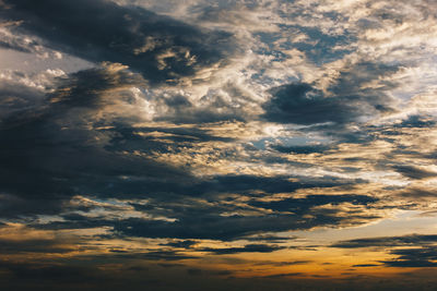 Low angle view of clouds in sky during sunset