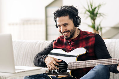 Young man playing guitar