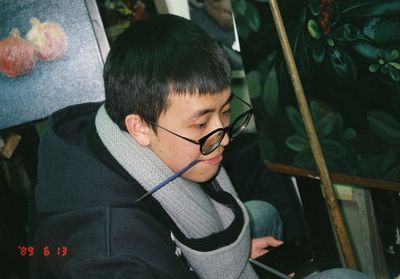 Portrait of young man with eyeglasses