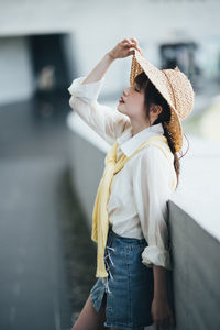 Young woman wearing hat