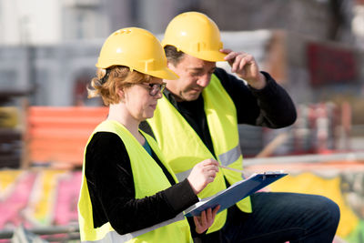 Architects working at construction site