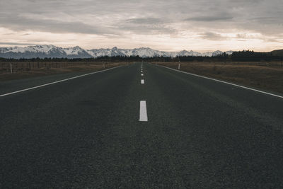 Road heading towards southern alps mountains, new zealand