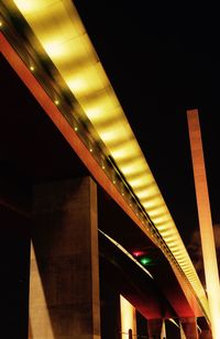 Low angle view of illuminated building at night