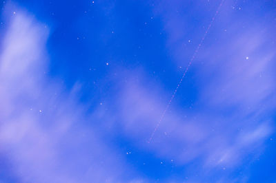 Low angle view of blue sky at night