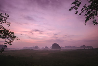 Scenic view of silhouette landscape against sky during sunset