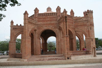 Low angle view of historical building against clear sky