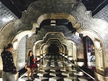 View of woman in tunnel