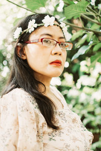 Portrait of a young woman with eyes closed