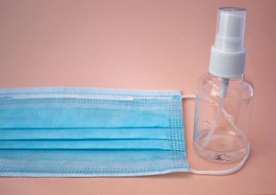 Close-up of bottle against blue background