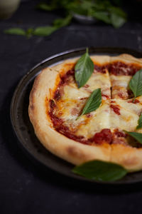 High angle view of pizza on table