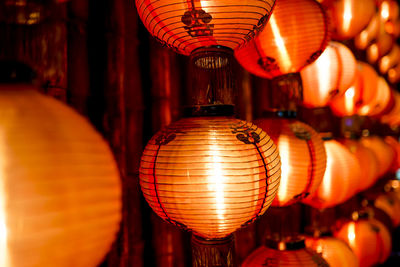 Illuminated lantern hanging at night
