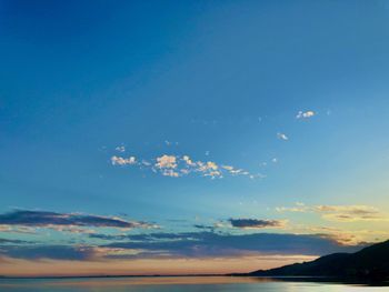 Scenic view of sea against sky at sunset