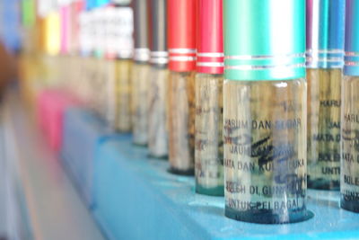 Close-up of multi colored pencils in jar