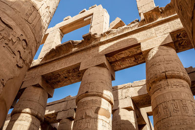 Different hieroglyphs on the walls and columns in the karnak temple.