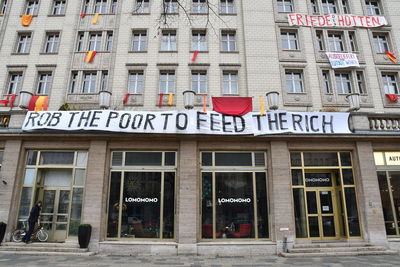 Low angle view of text on building