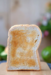 Close-up of bread on cutting board