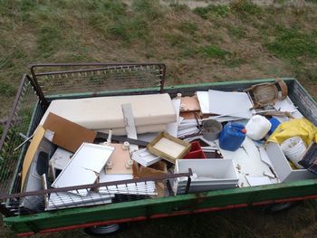 High angle view of garbage on field