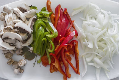 High angle view of chopped vegetables in plate