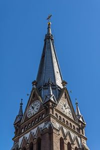 Low angle view of traditional building against clear blue sky