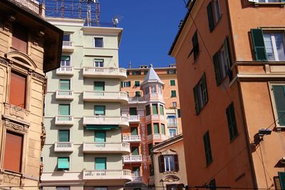 Low angle view of buildings against clear sky