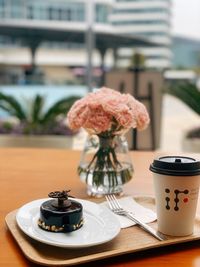 Close-up of coffee cup on table