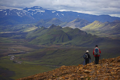 Hiker descending into a valley on the laugavegur trek