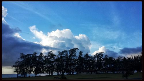 Scenic view of landscape against cloudy sky