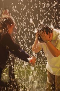 Close-up of woman standing in pond