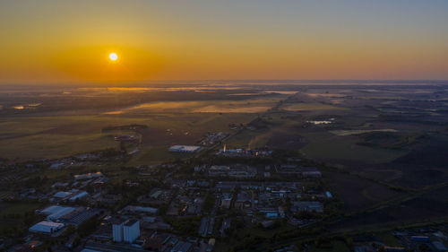 High angle view of townscape against sky during sunset