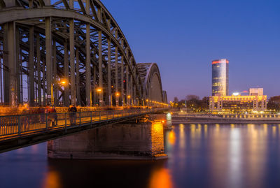 Reflection of illuminated buildings in water