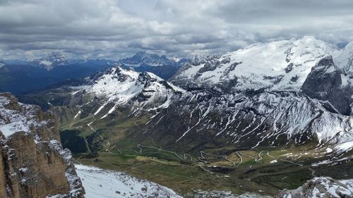 Scenic view of mountains against sky during winter