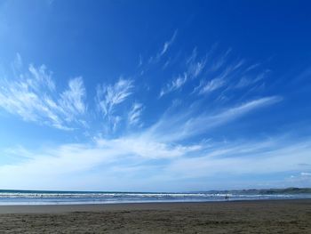 Scenic view of sea against blue sky