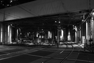 View of railroad station platform at night