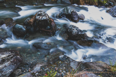 Close-up of water flowing over rocks