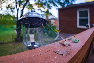 Close-up of house by water