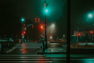 Illuminated street at night