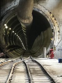 High angle view of railroad tracks in tunnel