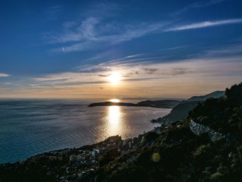 Scenic view of sea against sky during sunset