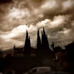 Built structure against cloudy sky