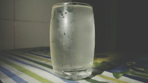Close-up of water in glass on table