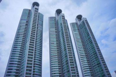 Low angle view of modern buildings against sky