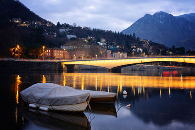 Scenic view of lake against sky at night