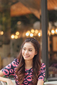 Portrait of a smiling young woman