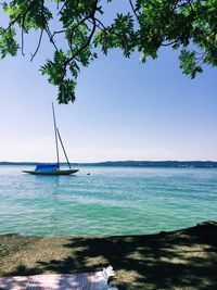 Boat on lake against sky