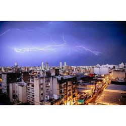 View of illuminated cityscape at night