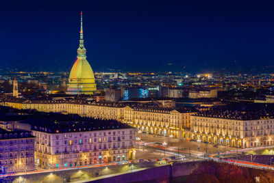 Illuminated buildings in city