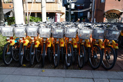 Bicycles parked on street in city