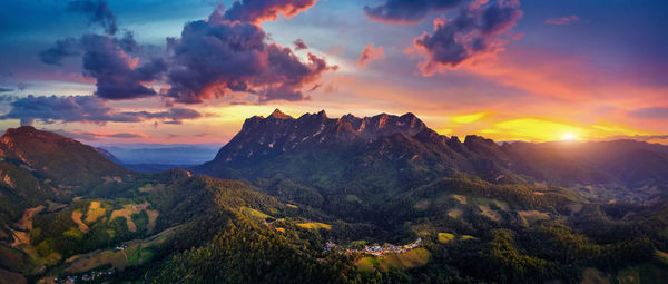 Scenic view of mountains against sky during sunset