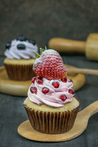 Close-up of cupcakes on table